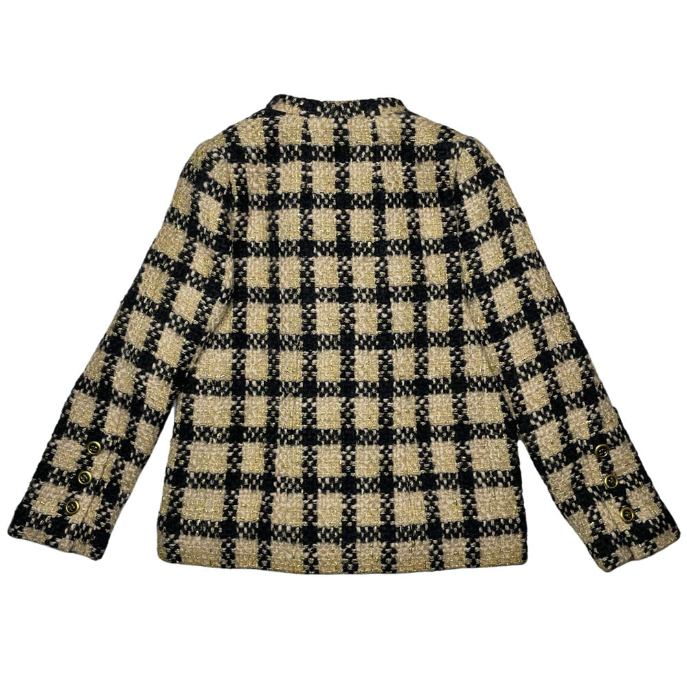 Chanel 1994 gold & black tweed jacket by Karl Lagerfeld for Chanel, autumn 1994 with wrist length sleeves, single snap button closure. Three Chanel CC gold & black buttons on each sleeve. Made in France