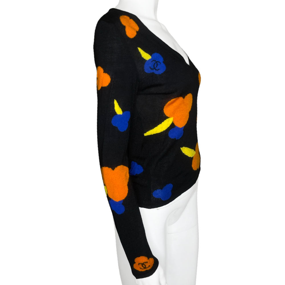 Karl Lagerfeld for Chanel, 2001 intarsia knit V-neck black sweater featuring orange, blue with yellow CC logo Camellia flower blossoms. No. M8078. Made in France