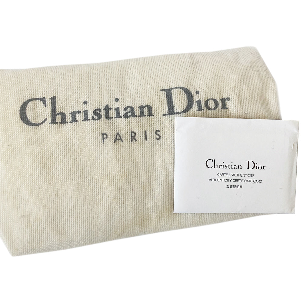 Christian Dior large pink monogram canvas boston by John Galliano for Dior, 2004 with white leather piping, cream patent leather accent trim, rolled handles and zipper pull, silver-tone hardware and feet. 2 exterior open pockets with leather accent, pink textile interior with one interior zip pocket, 2 slip pockets.
