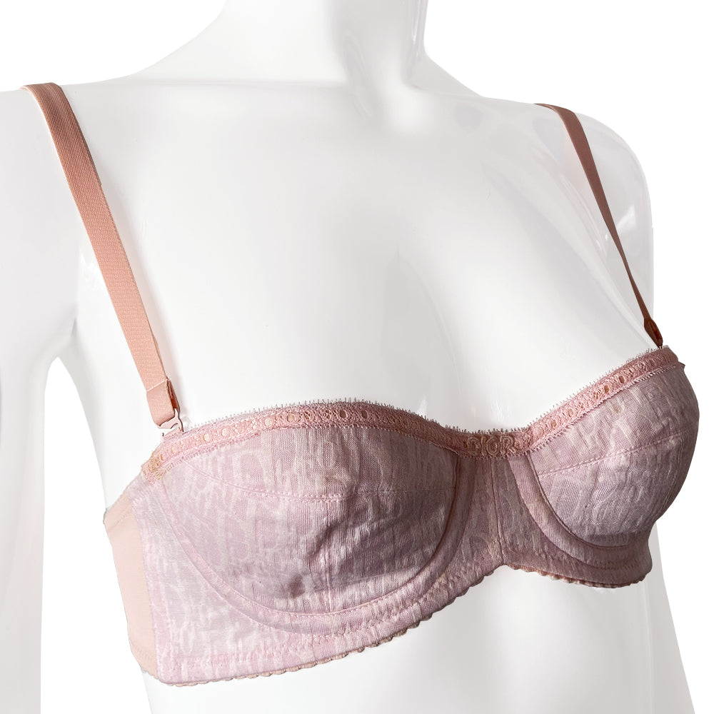 Christian Dior Monogram Trotter Pink Bra from Christian Dior Lingerie. Japanese Size: A70 All over monogram Trotter monogram pattern in pink on pink. Stretch satin adjustable straps with 3 hook closure Lace accent trim with delicate lace “Dior" in center.