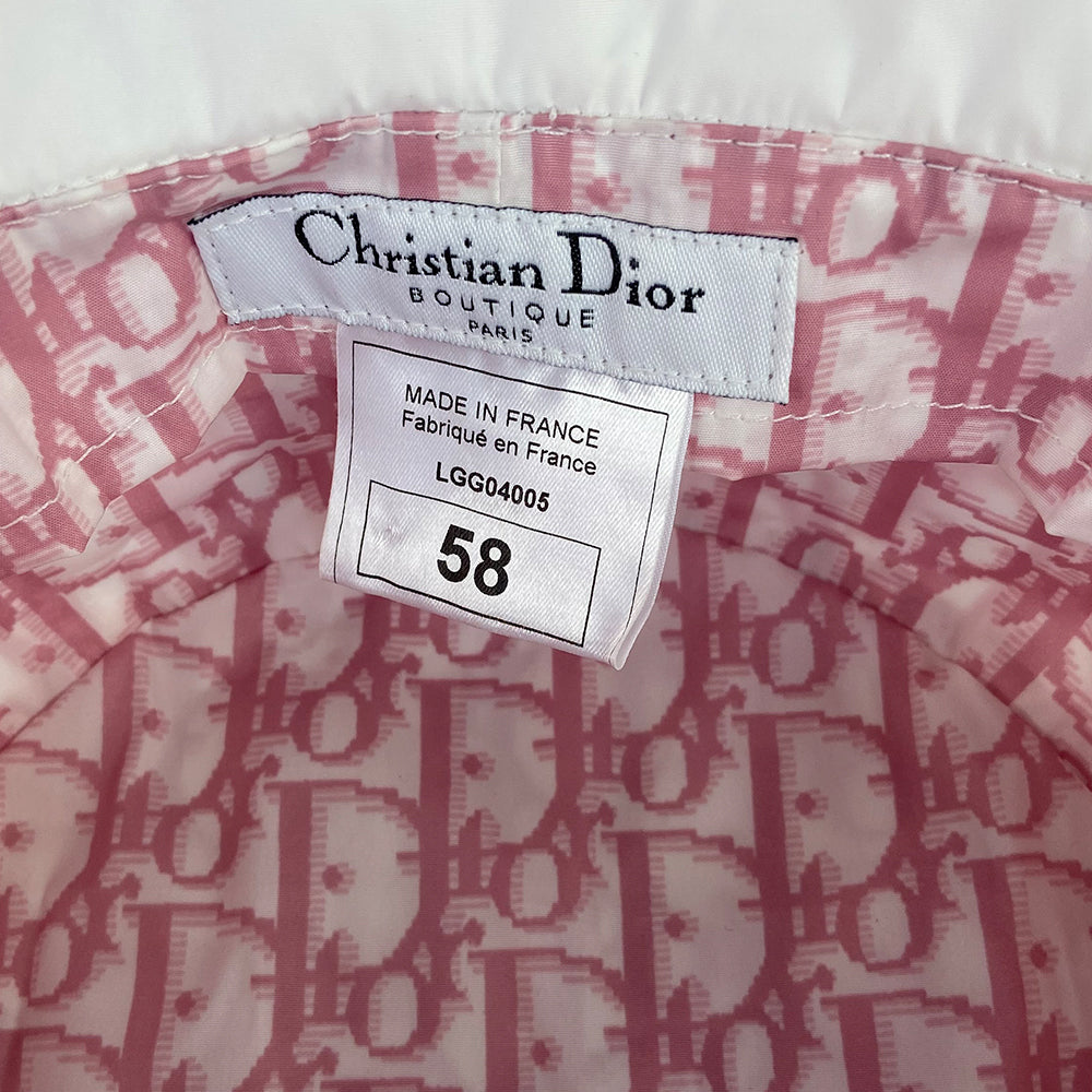 Christian Dior pink monogram bucket hat by John Galliano for Dior, 2005. Diorissimo print bucket hat with 2” brim. Tag size: 58.  Made in France.