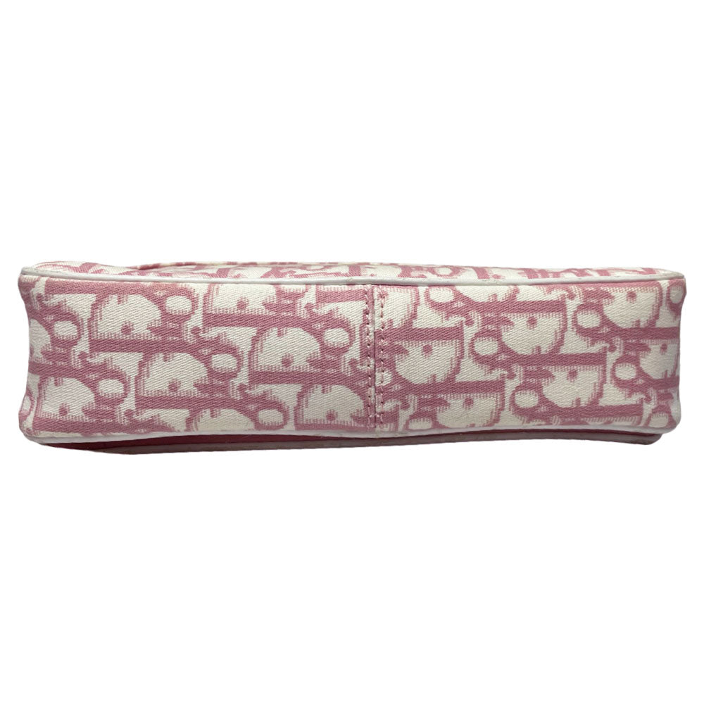 Christian Dior pink monogram canvas girly flap bag by John Galliano for Dior 2004 with pearl center white flowers, white patent piping, Swarovski crystal No 1 and Dior crystal logo. Pink with white edged satin canvas adjustable shoulder strap. Pink textile interior, one interior pocket. Made in Italy