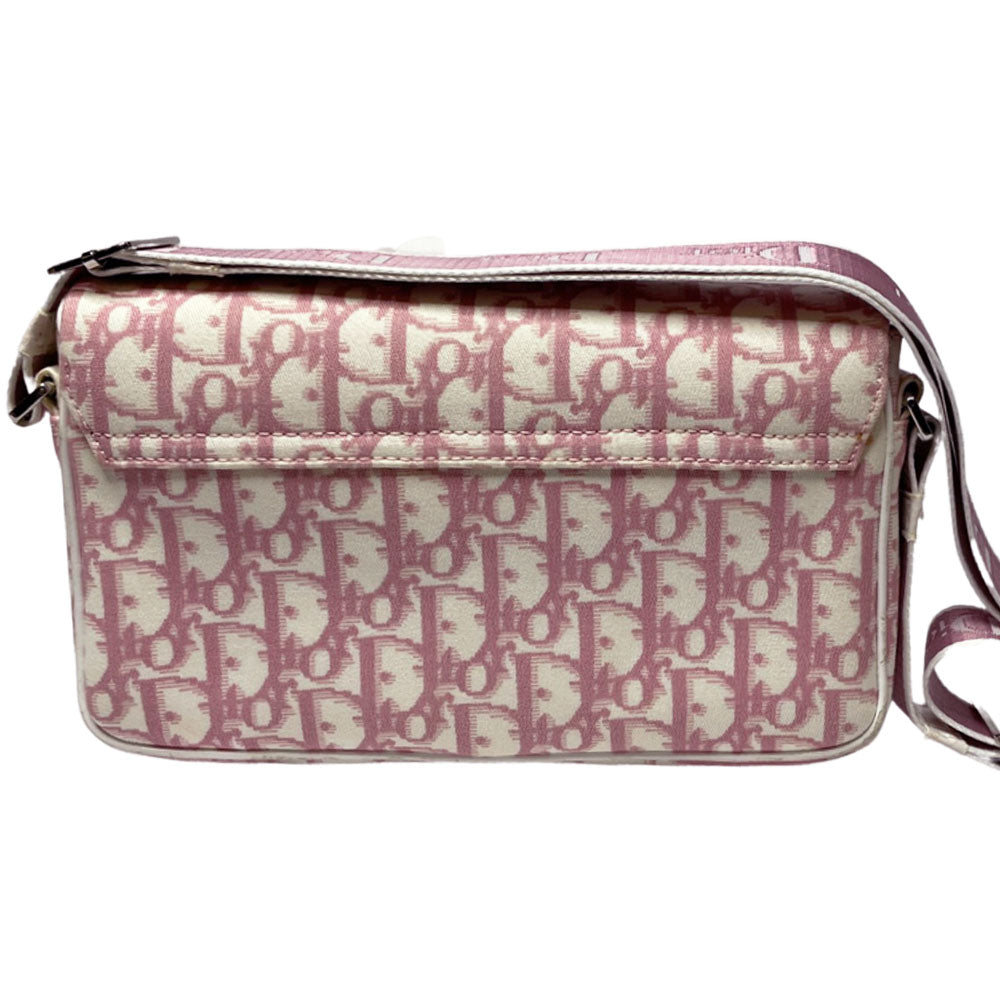 Christian Dior pink monogram canvas girly flap bag by John Galliano for Dior 2004 with pearl center white flowers, white patent piping, Swarovski crystal No 1 and Dior crystal logo. Pink with white edged satin canvas adjustable shoulder strap. Pink textile interior, one interior pocket. Made in Italy