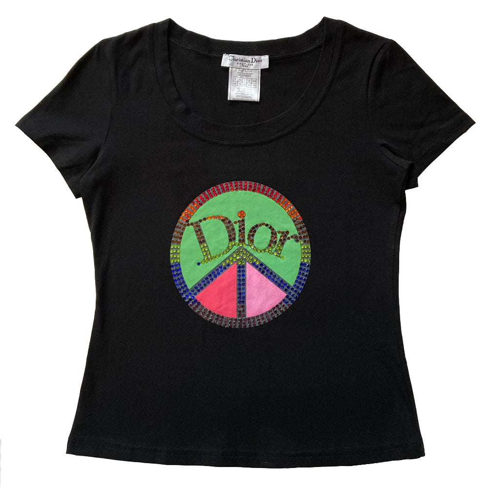 Christian Dior crystal peace sign tee from 2005 John Galliano for Dior. Short sleeves with rounded neckline, crystal embellished peace sign with crystal Dior logo at front center. Size: FR 42 Color: Main color: Black Good, consistent with age. Made in Italy