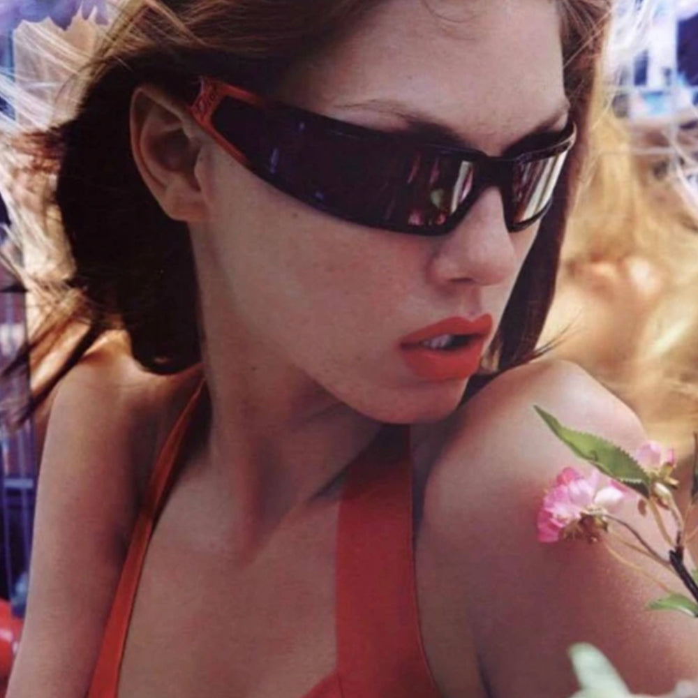 Christian Dior Bandage Runway Sunglasses From John Galliano Fall 2003 Ready to Wear Runway Collection with no Scratches on lens. Wrap around frame and lens with double banded arms. Color: Black lenses, black frame with red arms. Made in Italy. Side "DIOR” stamped logo. Includes Information booklet, case & branded neck strap included