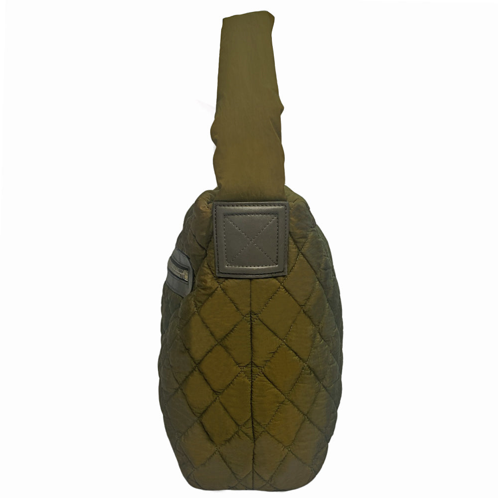 Chanel lightweight quilted green nylon shoulder bag by Karl Lagerfeld for Chanel, 2009/2010 with brown CC embossed brown leather accents at strap ends & around exterior silver-tone logo engraved outer pocket zipper. Interlocking CC stitched bottom logo. Zip top closure with red nylon interior, one zip pocket. Made in Italy