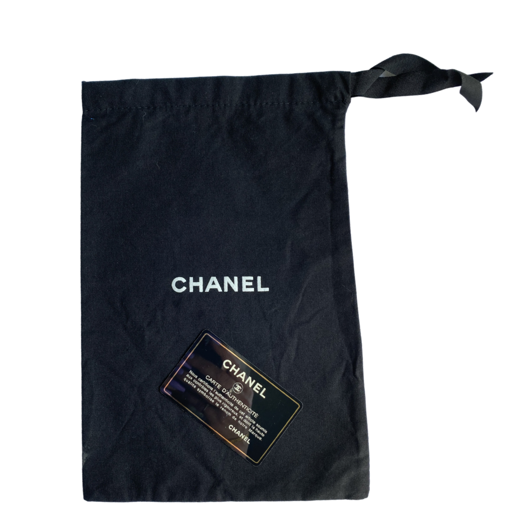 Chanel fuchsia choco quilt soft lamb double body flap bag with silver-tone metal ball chain strap and pink transluscent lucite baubles by Karl Lagerfeld for Chanel, 2000. Front bauble clasp closure with embedded silver-tone CC logo opens to dual partitioned compartments lined in tonal grosgrain, one interior zip pocket. Made in Italy