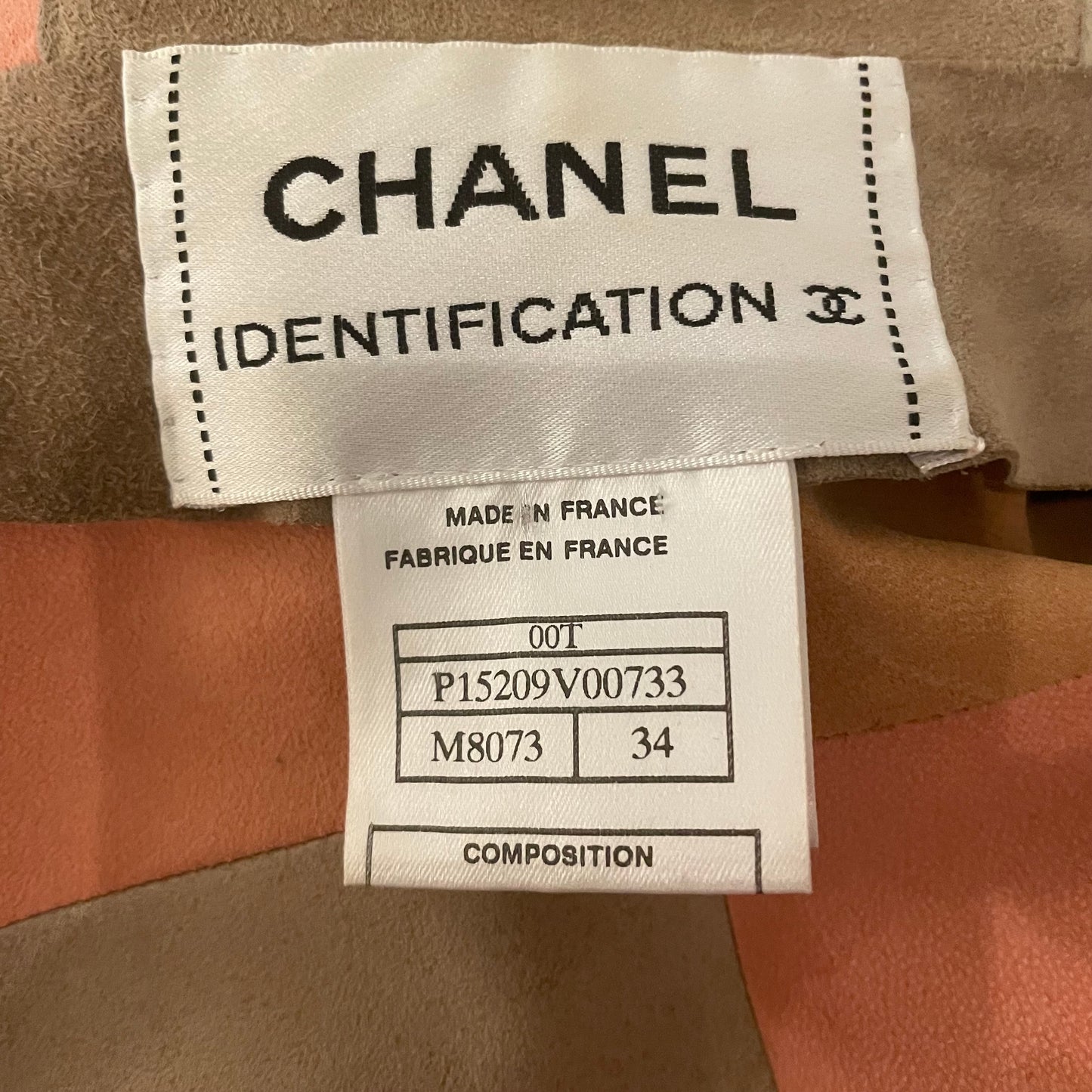 Karl Lagerfeld for Chanel, 2000 Identification Transition Collection buttery soft pastel beige, pink, tan, cream suede goatskin leather patchwork collared jacket with four brushed silver-tone CC logo buttons. Made in France