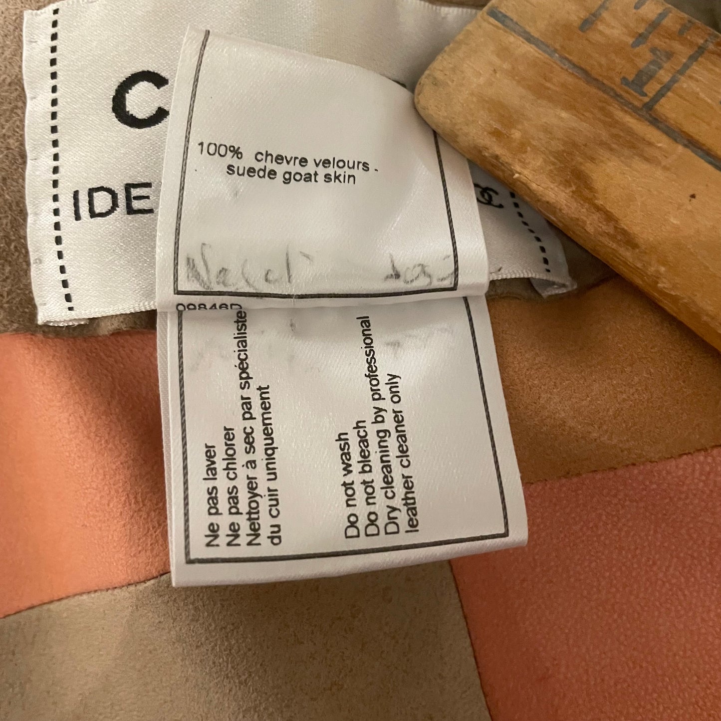 Karl Lagerfeld for Chanel, 2000 Identification Transition Collection buttery soft pastel beige, pink, tan, cream suede goatskin leather patchwork collared jacket with four brushed silver-tone CC logo buttons. Made in France