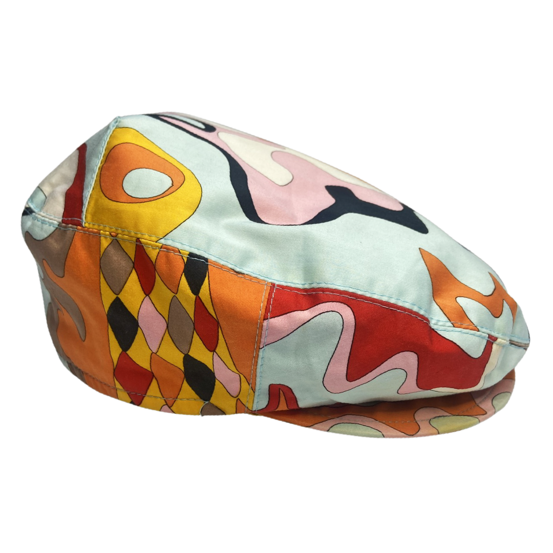 Pucci multicolor printed cotton cap in pink, white, powder blue, orange, black, burgundy with yellow grosgrain interior ribbon and yellow lining. Made in Italy