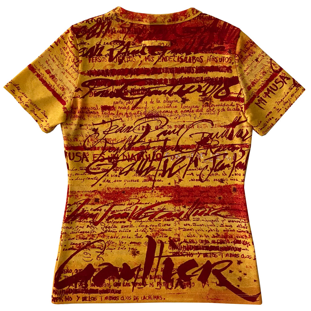 Jean Paul Gaultier yellow tight weave short sleeve mesh top Jean Paul Gaultier Femme, 1990’s featuring all over red graffiti style print. Tag size: 40 Fabric: 100% Polyamide. Made in Japan