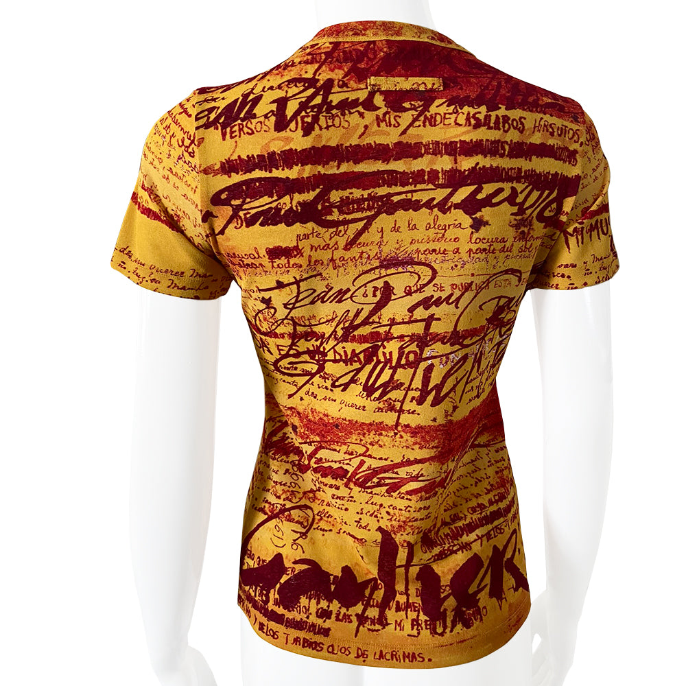 Jean Paul Gaultier yellow tight weave short sleeve mesh top Jean Paul Gaultier Femme, 1990’s featuring all over red graffiti style print. Tag size: 40 Fabric: 100% Polyamide. Made in Japan