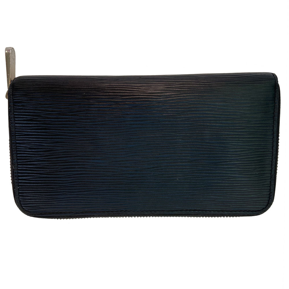 Louis Vuitton black epic Zippy Wallet from 2013. Silver-tone zipper and hardware 3 sided outer zipper with bill pocket, zipped coin pocket, 12 card slots, 3 open compartments with 1 bill slot. LV exterior heat stamp, engraved zipper pulls. Interior date code visible. Made in France 