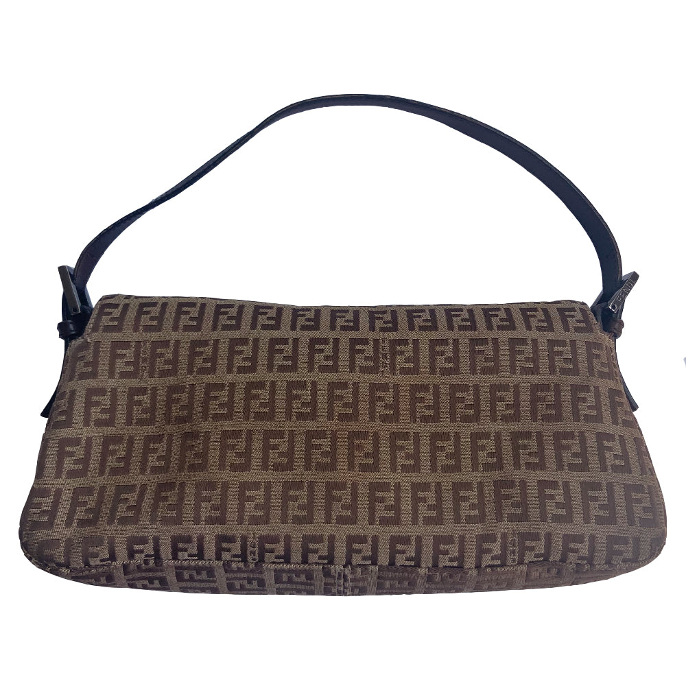 Fendi FF Zucca tan and brown canvas fabric baguette with adjustable chocolate color leather strap and accent, silver-tone Fendi engraved metal hardware and front logo. Front flap with single magnetic closure, canvas interior with Fendi engraved metal plate attached to single slip pocket. Made in Italy