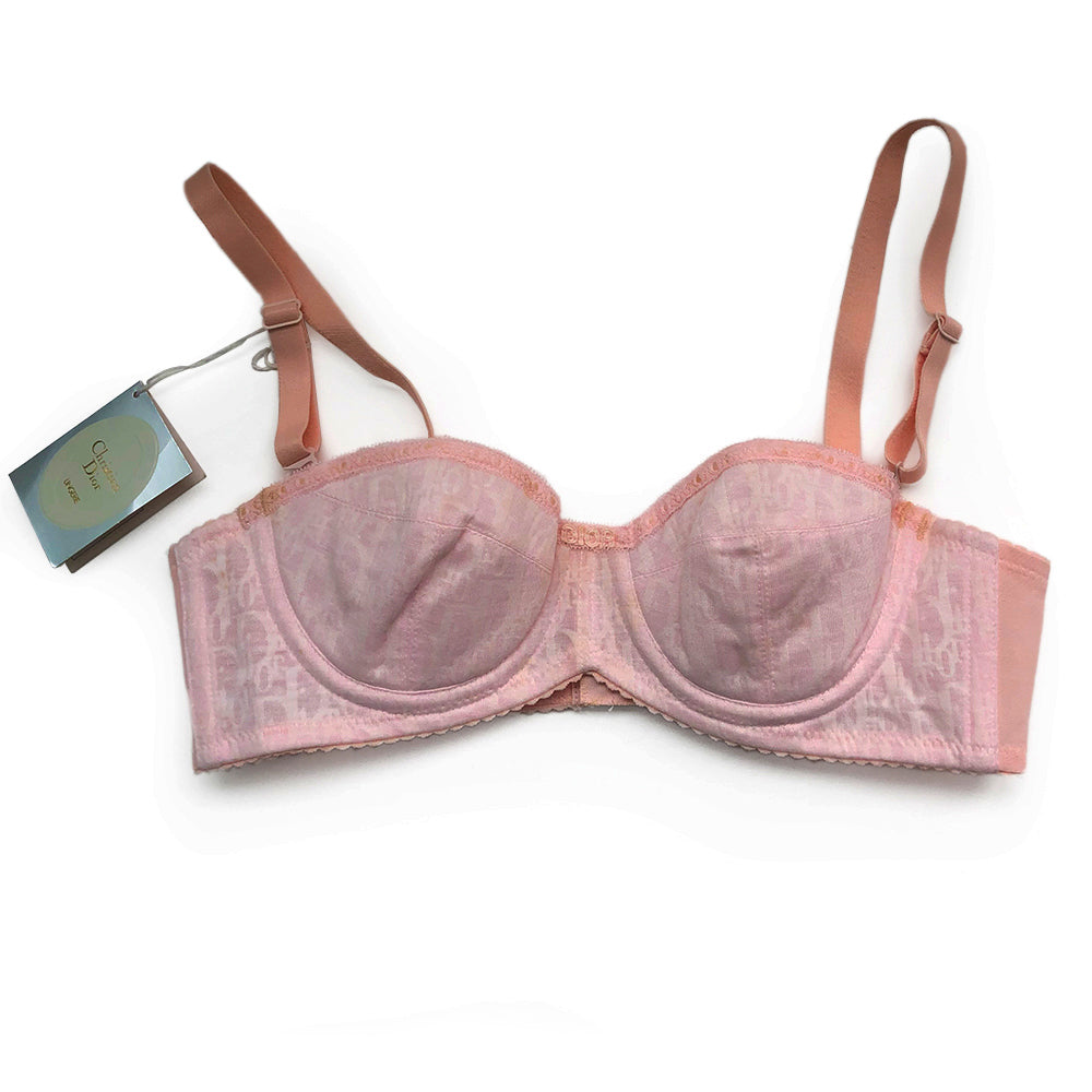 Christian Dior Monogram Trotter Pink Bra from Christian Dior Lingerie. Japanese Size: A70 All over monogram Trotter monogram pattern in pink on pink. Stretch satin adjustable straps with 3 hook closure Lace accent trim with delicate lace “Dior" in center.