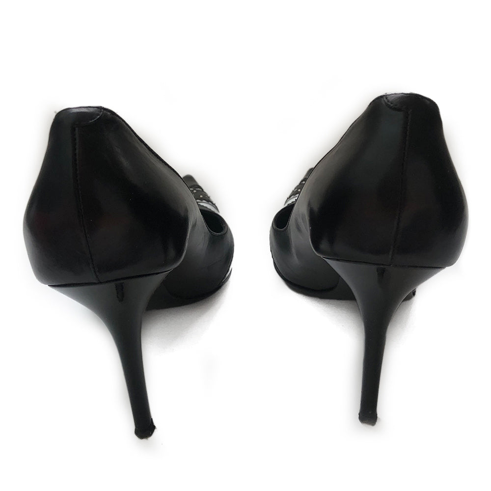 Dior D'Trick Black & White Leather D Pumps From the Spring 2004 RTW Collection By John Galliano. Perforated, scalloped leather silver D logo buckle, pointed toe. Box, dust bag and extra heel taps included. Made in Italy