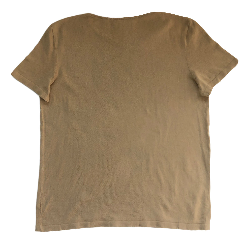Chanel Tan color Short Sleeved Knit Top Interlocking with CC logo woven into fabric in front. Small repair to right shoulder, visually minimal while wearing. Short sleeves with round neck in fine rib knit of 100% cotton. Color: Tan Size: FR 44 Made in France