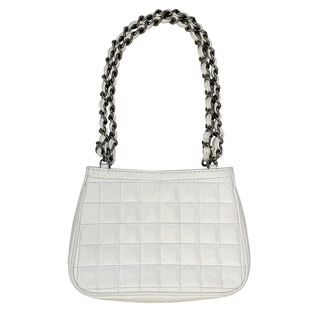 White Chanel Button Chain Quilted Shoulder Bag with 2 Gunmetal front buttons and 2 gunmetal chain link and interwoven leather straps, exterior quilted front pocket. Magnetic snap button closure, burgundy textile jacquard Chanel lining. Chanel Paris engraved on inside clasp. Interior hologram date code tag attached.