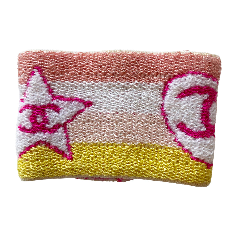 Chanel Sport heart and star sweatband wristband by Karl Lagerfeld for Chanel, cruise collection 2004 cruise. 4 color pastel striped elasticized terry knit sport wristband featuring fuchsia CC logo heart and star Color: Peach, white, pastel pink, yellow stripes, fuchsia heart and star logo