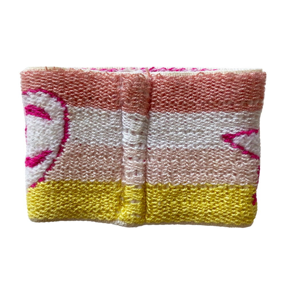 Chanel Sport heart and star sweatband wristband by Karl Lagerfeld for Chanel, cruise collection 2004 cruise. 4 color pastel striped elasticized terry knit sport wristband featuring fuchsia CC logo heart and star Color: Peach, white, pastel pink, yellow stripes, fuchsia heart and star logo
