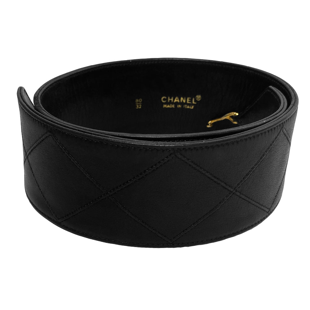 Chanel circa 1980 black lamb leather diamond quilted wide belt with attached interwoven gold plated chain with leather hanging CC gold-tone logo charm, hook closure. Made in Italy
