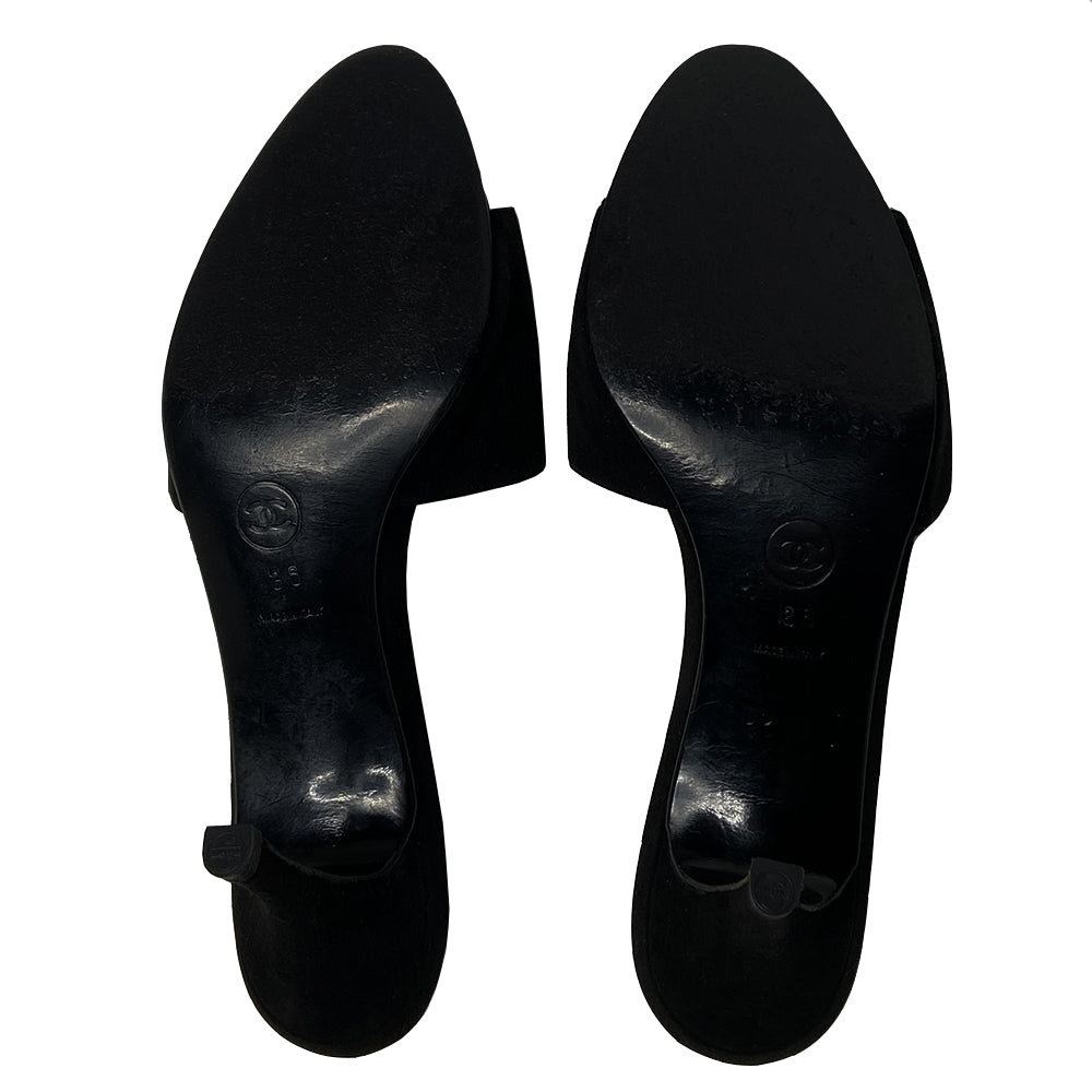 Chanel black black suede open toe heels with stitched CC interlocking logo and suede heels. Leather insole and bottom sole with new heel taps.Size: 36. Made in Italy. Heel height 3"