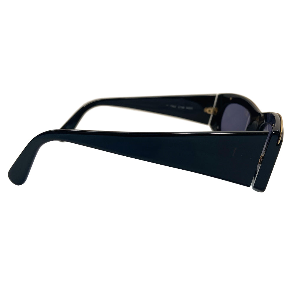 Chanel Paris CC logo black acetate frame sunglasses from the 1990’s by Karl Lagerfeld for Chanel embellished with gold-tone Chanel Paris engraved strip across the top from edge to edge and thick side arms and blue lenses. Style: 07798 94305. Made in Italy