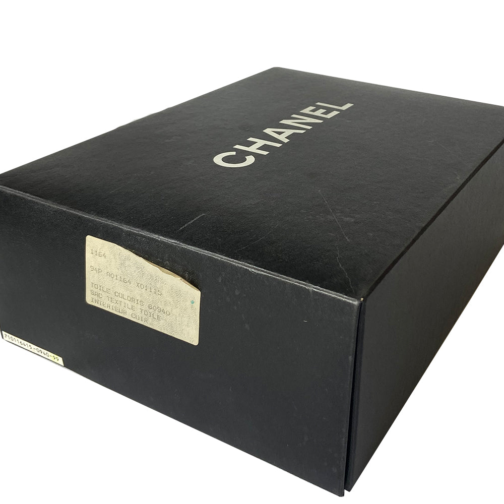 Chanel suede camera bag by Karl Lagerfeld for Chanel, 1991-94. Pistachio color quilted suede, top zipper, etched gold ball and tassels zipper pull, suede and gold chain shoulder strap. Outer flap pocket with engraved gold CC turn-lock, tonal leather lining, patch slip and zippered pocket with gold zipper pull. Made in France