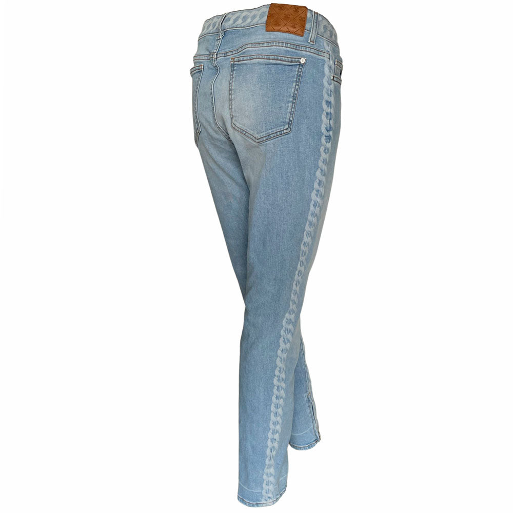 Chanel 2019 mid rise skinny faded wash 5 pocket stretch denim pants with faded white chain link design at waistband and down outer legs, CC engraved logo silver-tone rivets and top button, 5 " CC logo ankle zippers. Belt loops at waistband, calfskin leather diamond stitched CC logo patch at waistband. Made in Italy