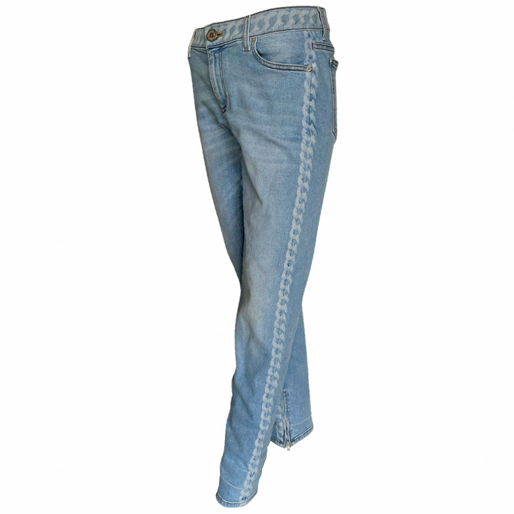 Chanel 2019 mid rise skinny faded wash 5 pocket stretch denim pants with faded white chain link design at waistband and down outer legs, CC engraved logo silver-tone rivets and top button, 5 " CC logo ankle zippers. Belt loops at waistband, calfskin leather diamond stitched CC logo patch at waistband. Made in Italy