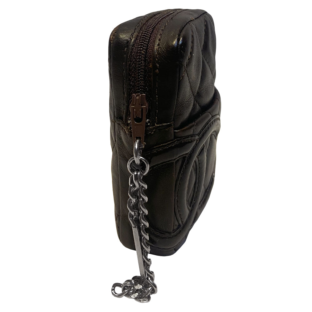 Chanel Cambon quilted brown leather cigarette case by Karl Lagerfeld for Chanel, circa 2004-2005 with outer slip pocket, tonal interlocking CC logo stitched appliqué. Rear leather belt loop, top zip closure with silver-tone metal logo engraved chain zipper pull. Orange CC logo textile lining Interior. Made in France