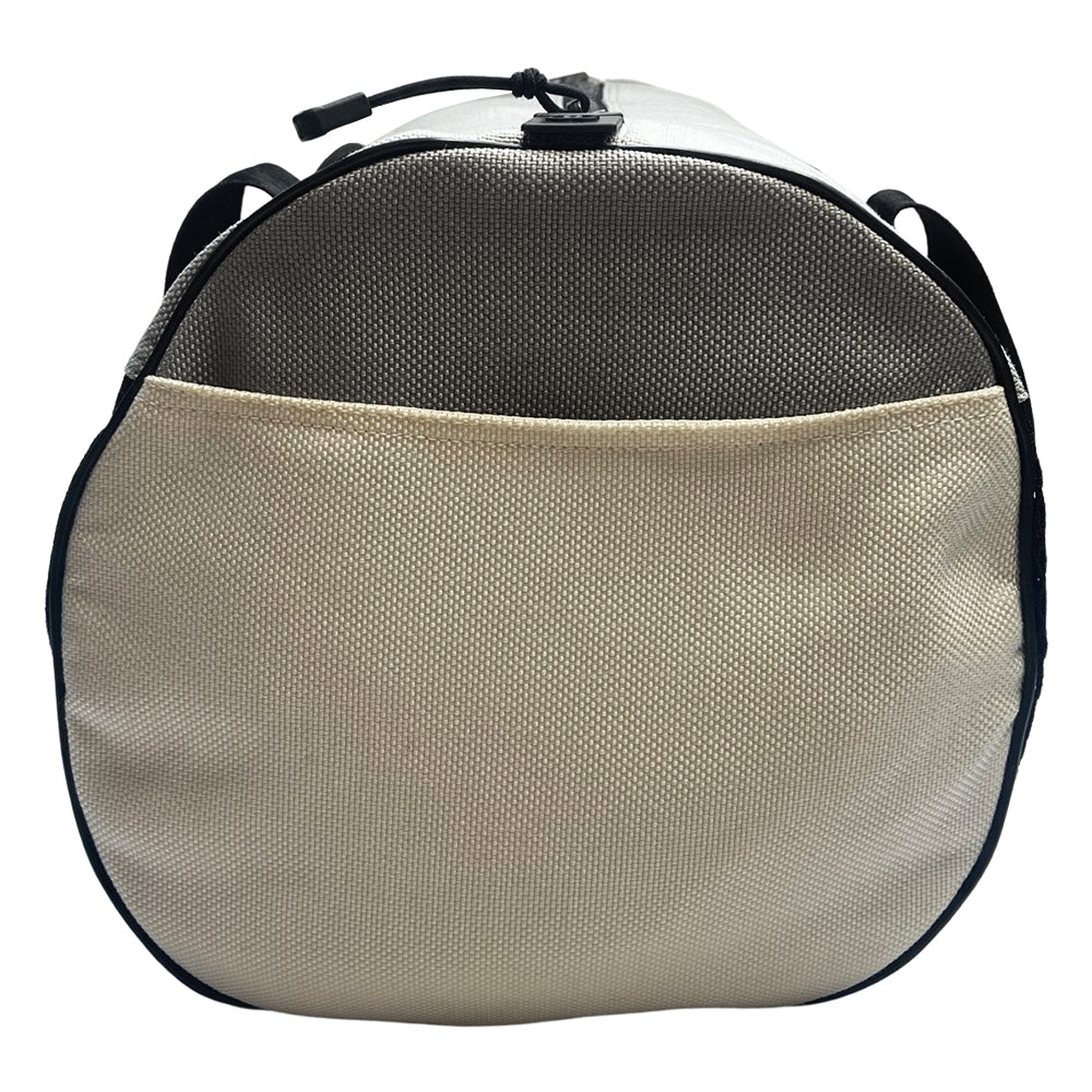 Chanel sport canvas and mesh large grey/black/cream duffle bag by Karl Lagerfeld for Chanel, 2003/2004 zipper closure and boxed rubber CC front logo, 2 exterior end pockets and one exterior front pocket. Double Chanel embossed satin webbing logo carry straps. Serial number sticker attached. Made in Italy