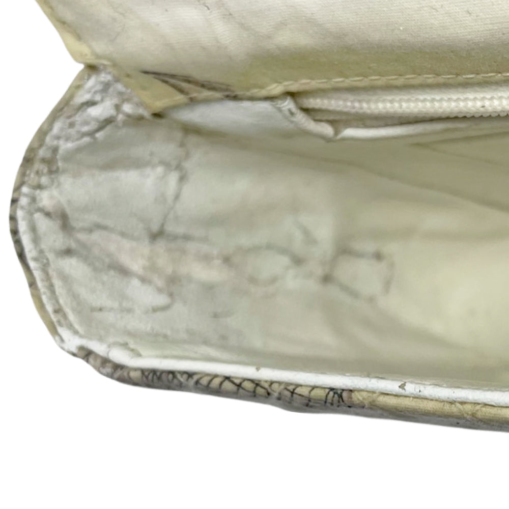 Karl Lagerfeld for Chanel 1996 printed quilt fabric flap bag with flower blossoms, pearl strands, CC logos, Chanel shoe, silver-tone CC turnlock closure, rear slip pocket, double intertwined chain and fabric chain strap, white leather lining. Interior zip pocket, 1 slip pocket, Date code tag attached. Made in France