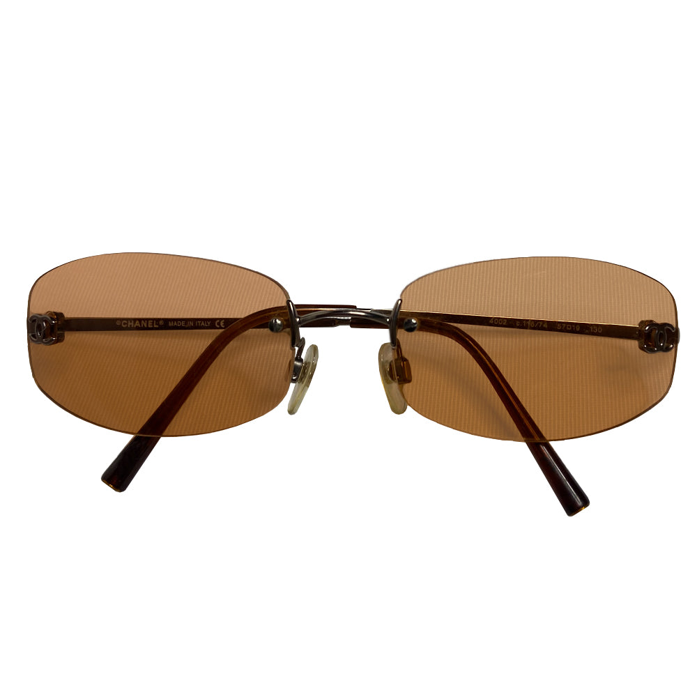 Chanel CC Logo Orange Lens Rimless Sunglasses