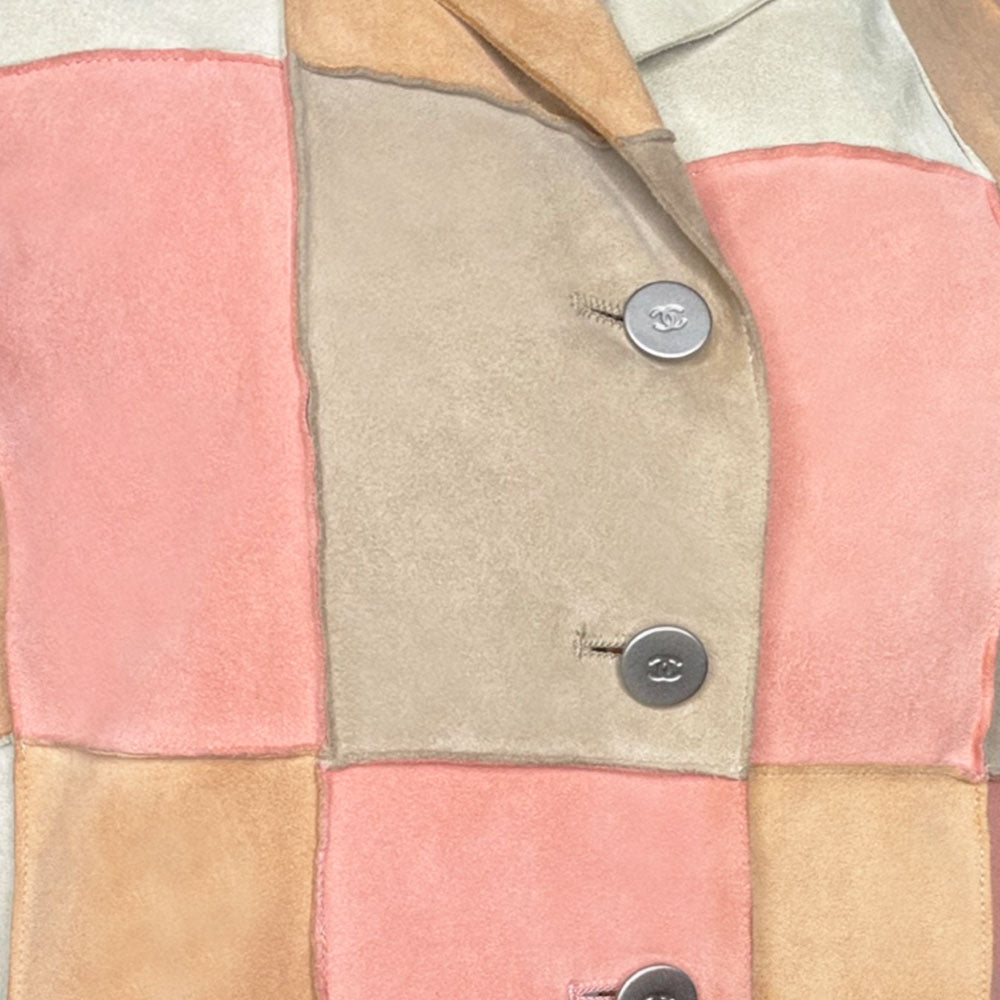 Karl Lagerfeld for Chanel, 2000 Identification Transition Collection buttery soft pastel beige, pink, tan, cream suede goatskin leather patchwork collared jacket with four brushed silver-tone CC logo buttons. Made in France