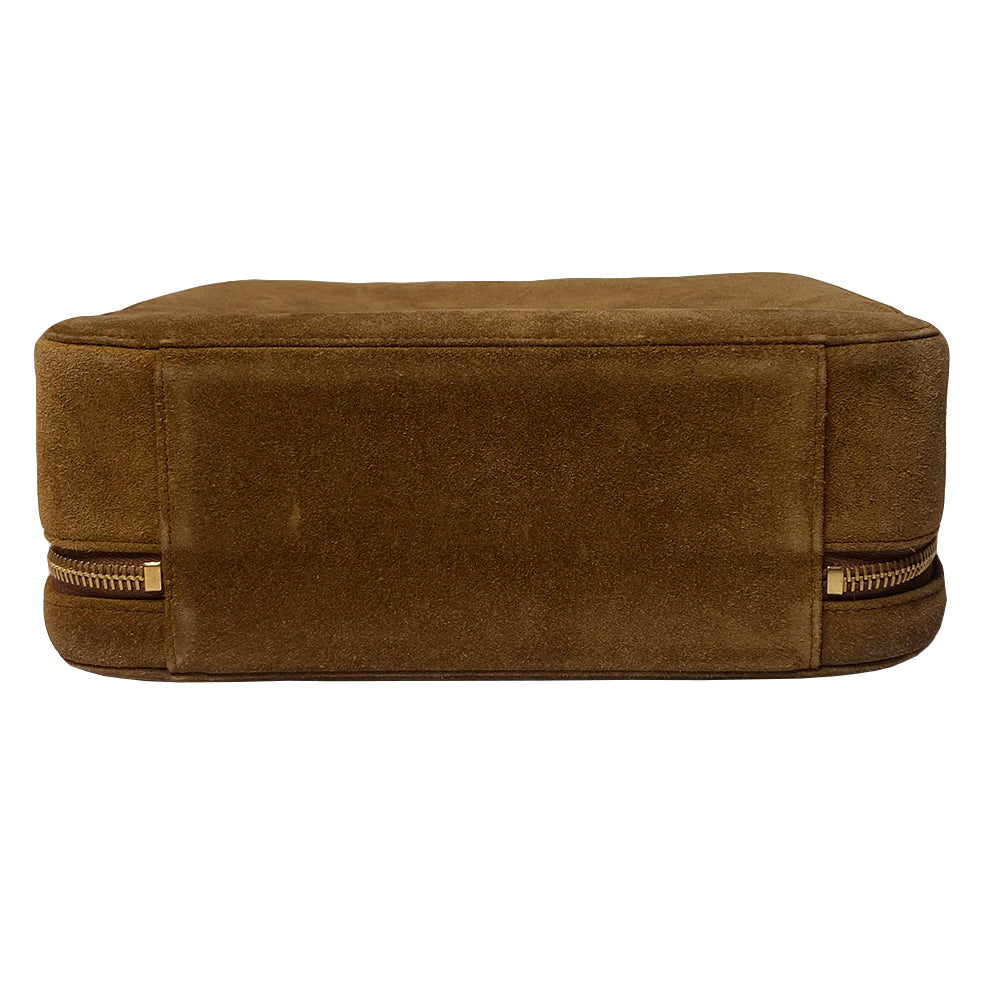 Chanel tobacco suede vanity case by Karl Lagerfeld for Chanel 1997-1999. Rectangular top handle bag with interlocking stitched CC logo at front, dual suede paddle zipper pull closure, chocolate leather interior with one zippered pocket and one slip pocket. Serial number sticker attached. Made in Italy