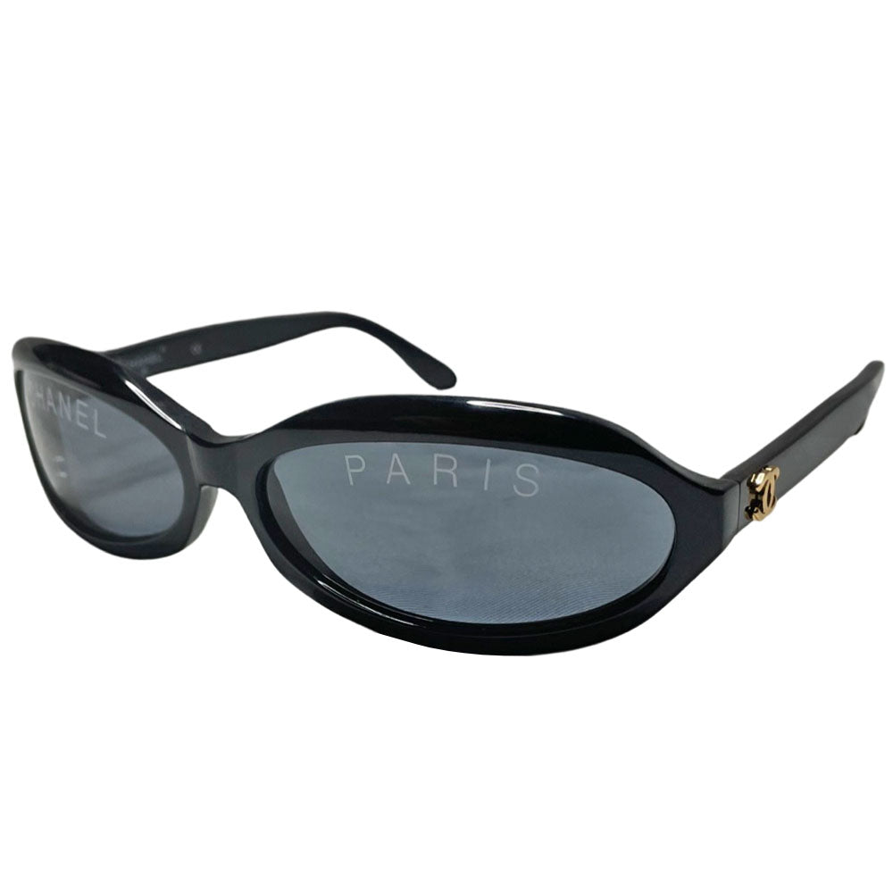 Chanel Paris logo oval acetate frame runway sunglasses by Karl Lagerfeld for Chanel, spring 1993 with gold CC logos on sides and "CHANEL PARIS" printed on lenses. Made in italy