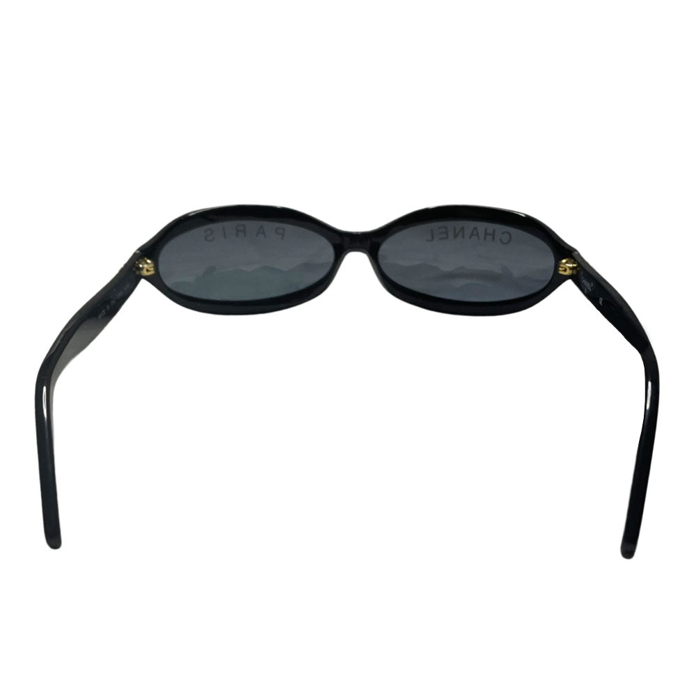 Chanel Paris logo oval acetate frame runway sunglasses by Karl Lagerfeld for Chanel, spring 1993 with gold CC logos on sides and "CHANEL PARIS" printed on lenses. Made in italy