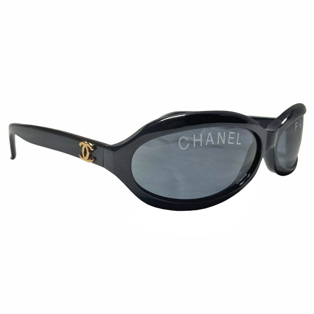 Chanel Paris logo oval acetate frame runway sunglasses by Karl Lagerfeld for Chanel, spring 1993 with gold CC logos on sides and "CHANEL PARIS" printed on lenses. Made in italy