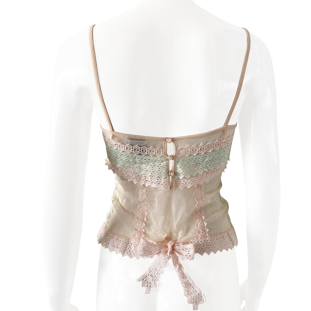 2004 embellished with diamond pattern accent with interlocking CC logos woven throughout. Three back CC logo buttons and bow at lower hem in pastel pink, mint, eggshell. Made in Italy