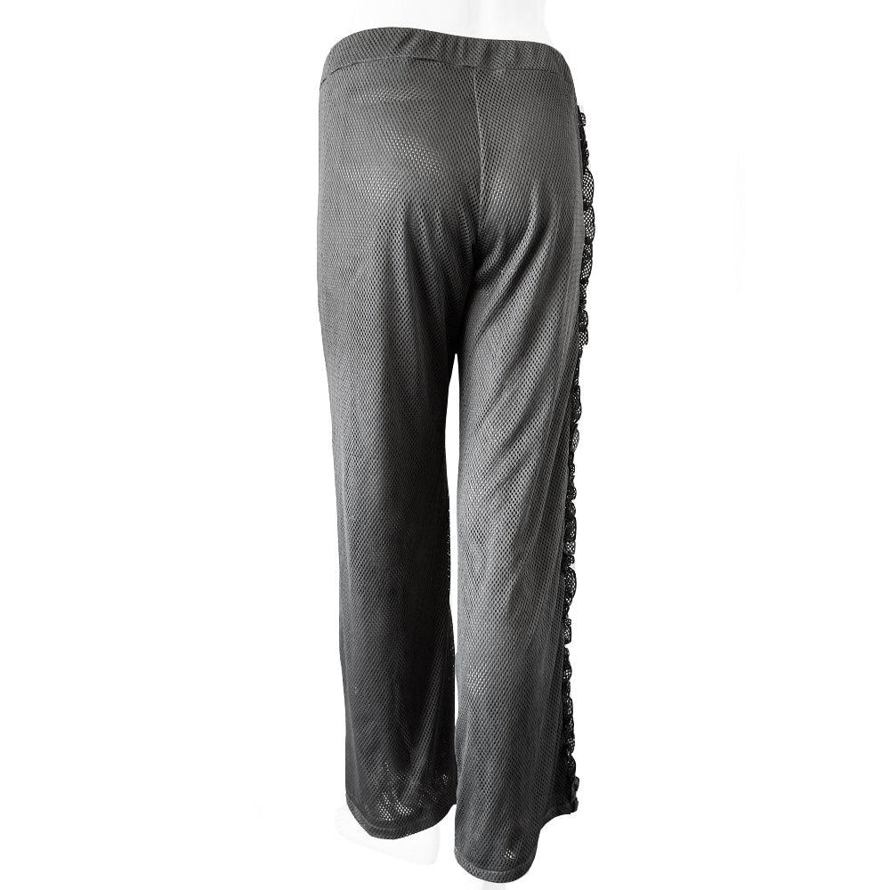 Chanel grey mesh drawstring pants with side frill from Spring 2003. High waisted wide leg pants made from see through double layered mesh with side zip pockets. Drawstring with CC logo engraved brushed silver-tone metal ends. Frill accent from waist to bottom hemline with Box CC logo at lower left leg. Made in Italy