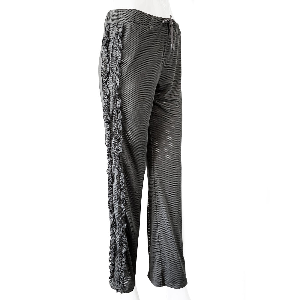 Chanel grey mesh drawstring pants with side frill from Spring 2003. High waisted wide leg pants made from see through double layered mesh with side zip pockets. Drawstring with CC logo engraved brushed silver-tone metal ends. Frill accent from waist to bottom hemline with Box CC logo at lower left leg. Made in Italy