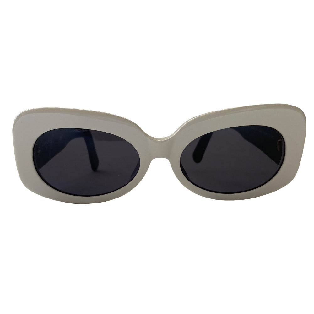 Chanel Black & White acetate frame sunglasses from Spring 1995 by Karl Lagerfeld for Chanel RTW runway. Butterfly style white frames with thick black side arms and charcoal lenses Interlocking gold-tone inset CC logos at each arm Style: 05252 C0200. Made in Italy