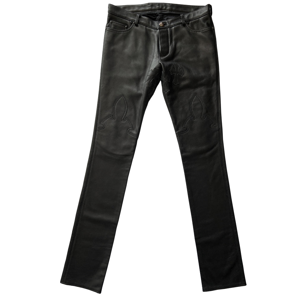 Custom-made unused black leather pants by Chrome Hearts, Los Angeles Front CH appliqué fleur du lis patch at front knees. 5 cross patches, Chrome Hearts jacquard silk lining, 5 sterling silver fly buttons. Three front pockets with sterling grommets, back pocket with sterling Chrome Hearts banner, Interior leather Chrome Hearts USA banner embossed patch.