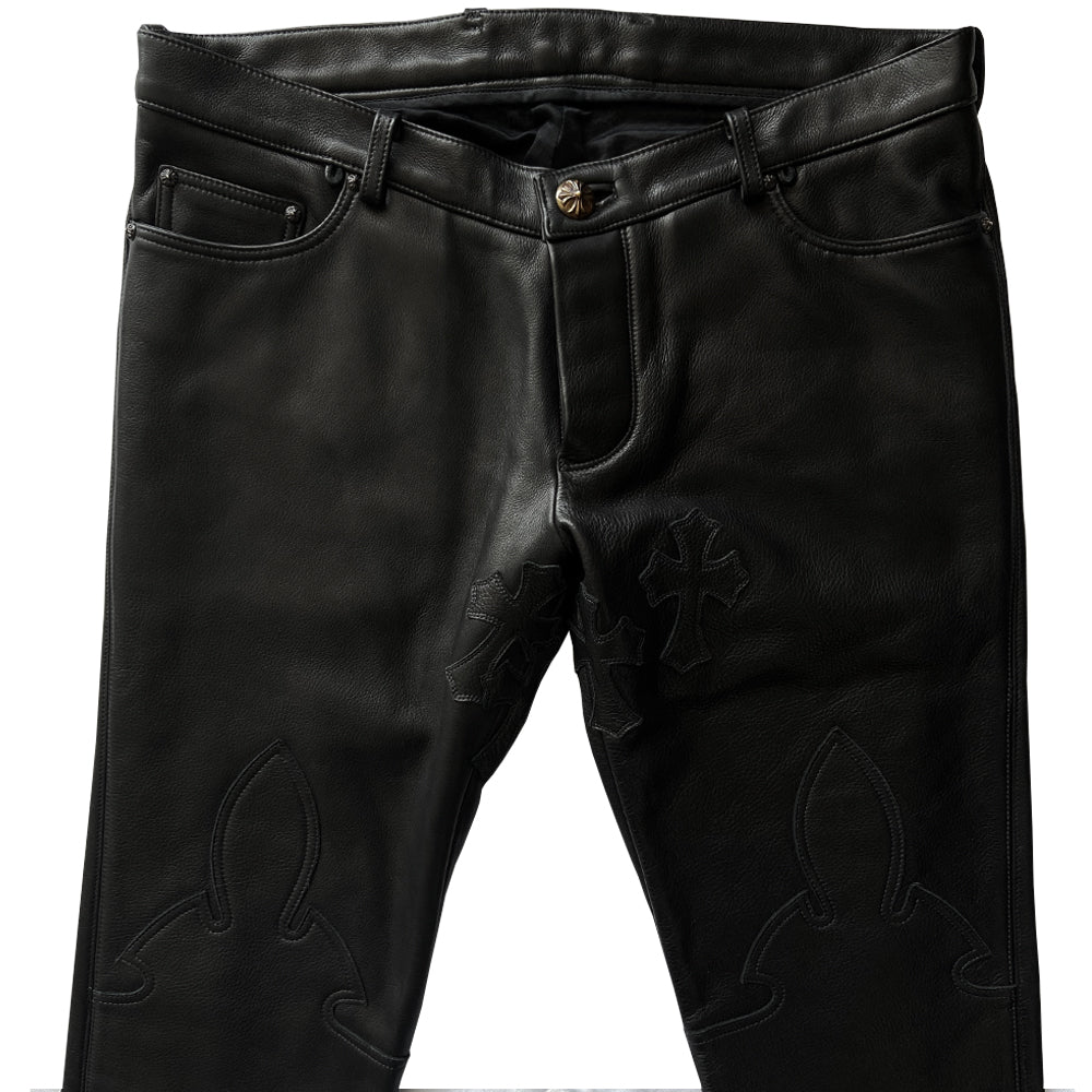 Custom-made unused black leather pants by Chrome Hearts, Los Angeles Front CH appliqué fleur du lis patch at front knees. 5 cross patches, Chrome Hearts jacquard silk lining, 5 sterling silver fly buttons. Three front pockets with sterling grommets, back pocket with sterling Chrome Hearts banner, Interior leather Chrome Hearts USA banner embossed patch.