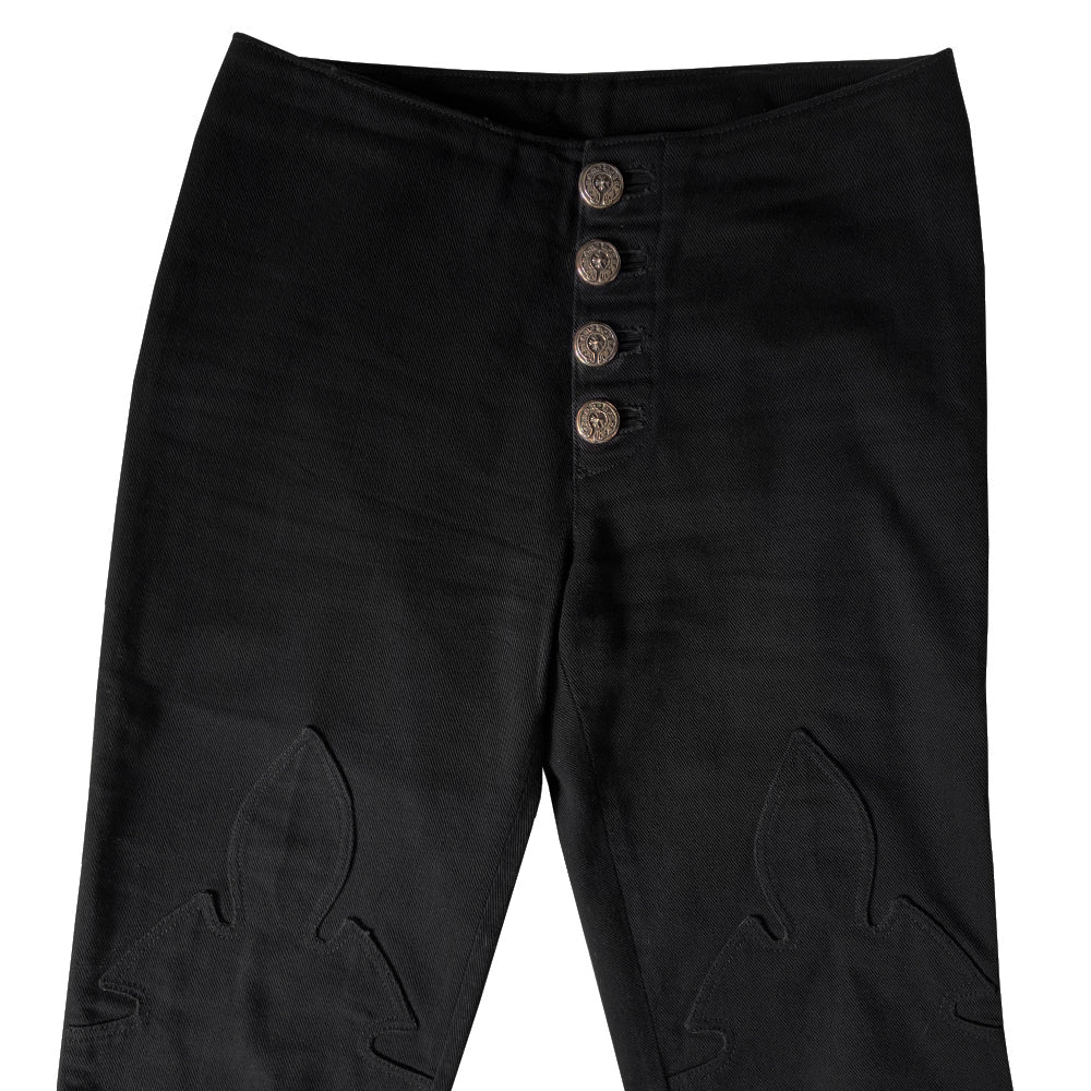 Chrome Hearts black denim pants From early 2000’s mid rise denim pants with 4 Chrome Hearts logo sterling silver front button closure. Buttons attached with screw back. CH signature appliqué fleur du lis patch at front knees, interior Leather Chrome Hearts USA banner embossed patch. Size: 26R