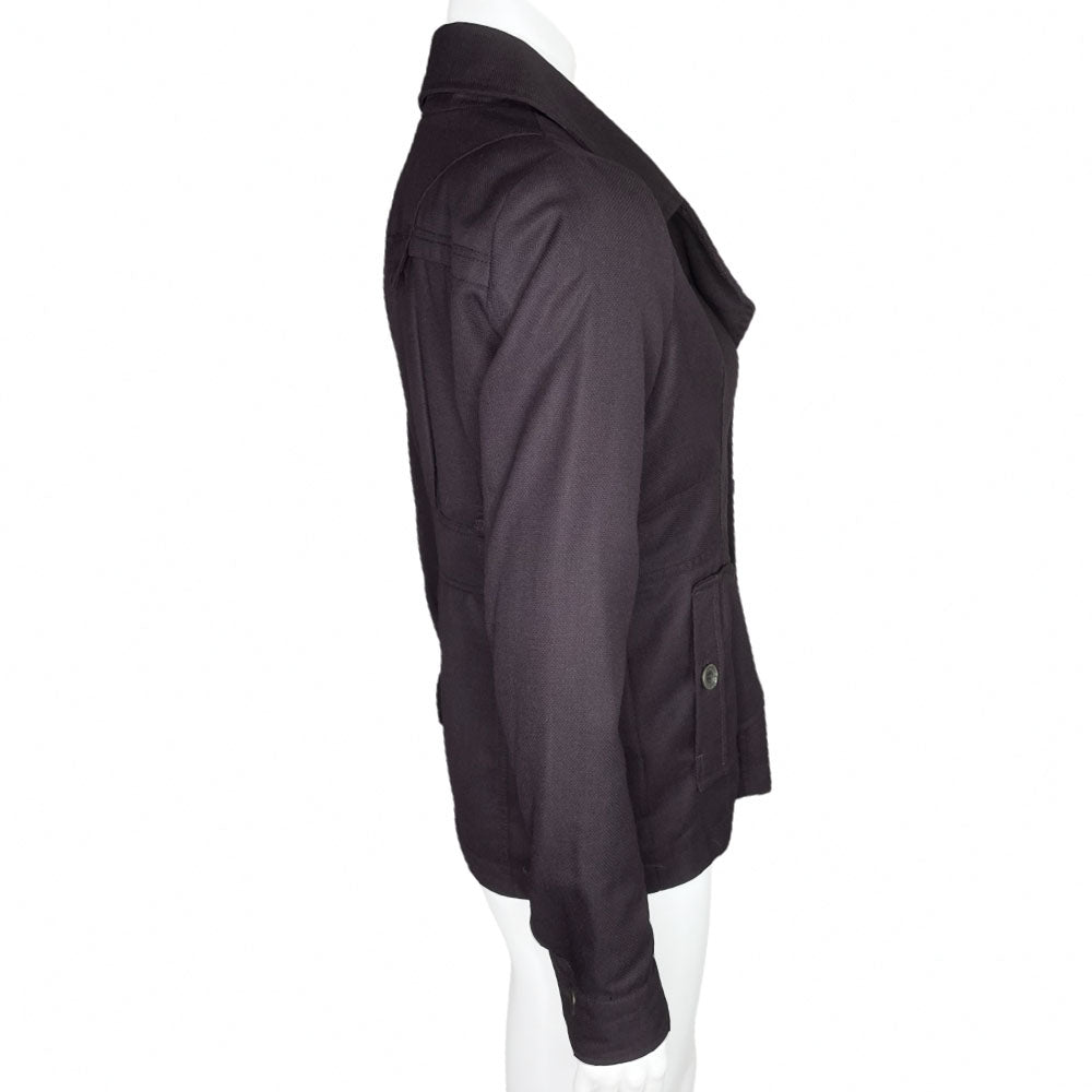 Diesel hip length collared purple wool jacket with grommet detail, silver-tone front button closure, rounded patch pockets with buttons, buttons at sleeve hem, satin detail