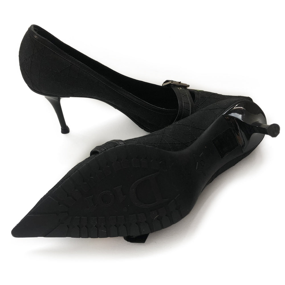 Dior "Rasta" Quilted Pumps from Fall 2004 Ready to Wear Collection. Canvas Dior cannage quilted with leather accents, black pointed toe, rubber sole, silver buckles with red, yellow and green accent ribbon. Size 40