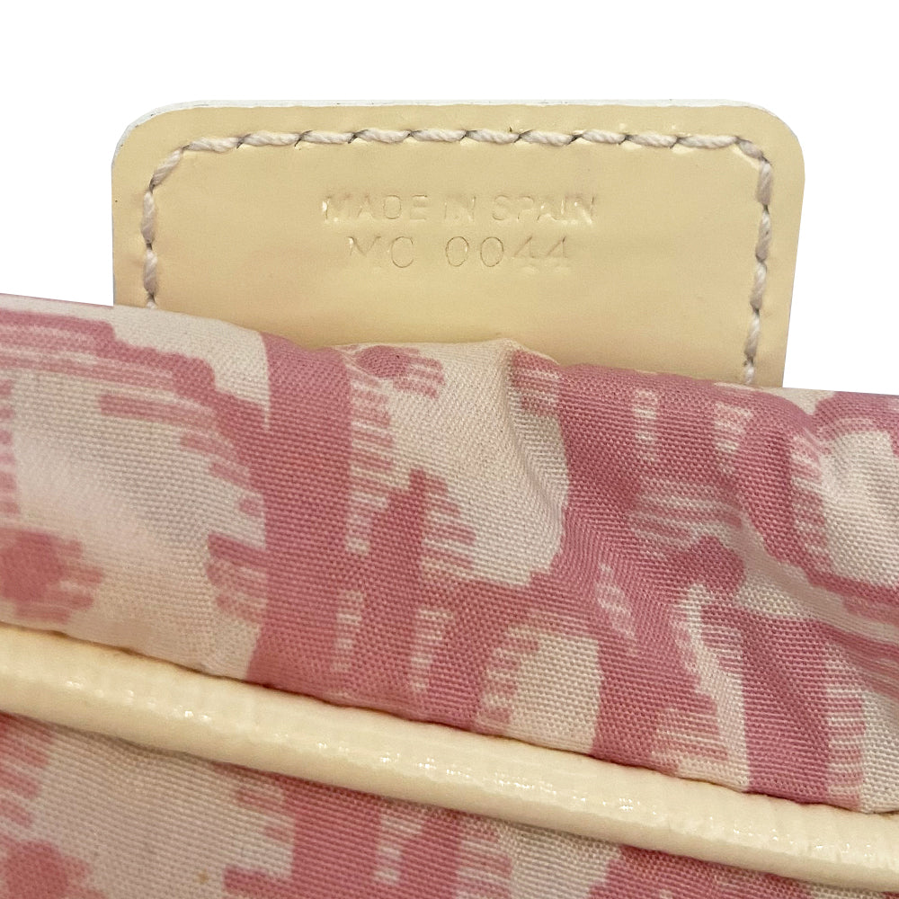 Christian Dior pink monogram canvas waist pouch John Galliano for Dior, 2004 with white patent leather appliqué No 2, dual front stripes and piping. Pink with white edge satin webbing adjustable belt with white plastic logo clip closure. Pink textile lined interior, two rear zip pocket. Made in Spain