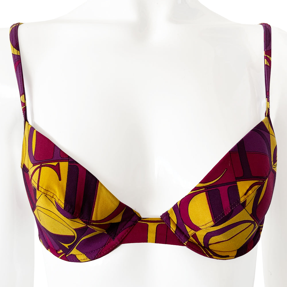 Christian Dior Purple and Yellow CD Logo Bikini with mid rise bottoms and all over modern CD logo print in purple and yellow. Molded bra cups with underwire Gold CD logo clasp closure in back, non-adjustable stretch straps. Made in France